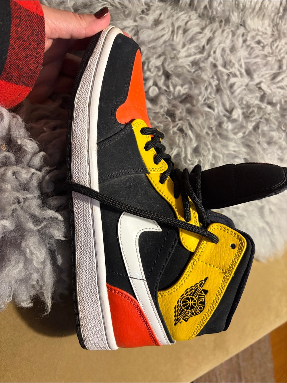 Jordan unisex High-Top Sneakers in Black, Orange & Yellow.